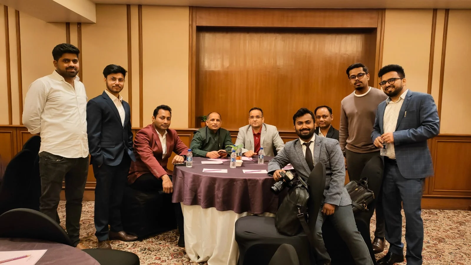 A small group of entrepreneurs connecting at an NCE meeting